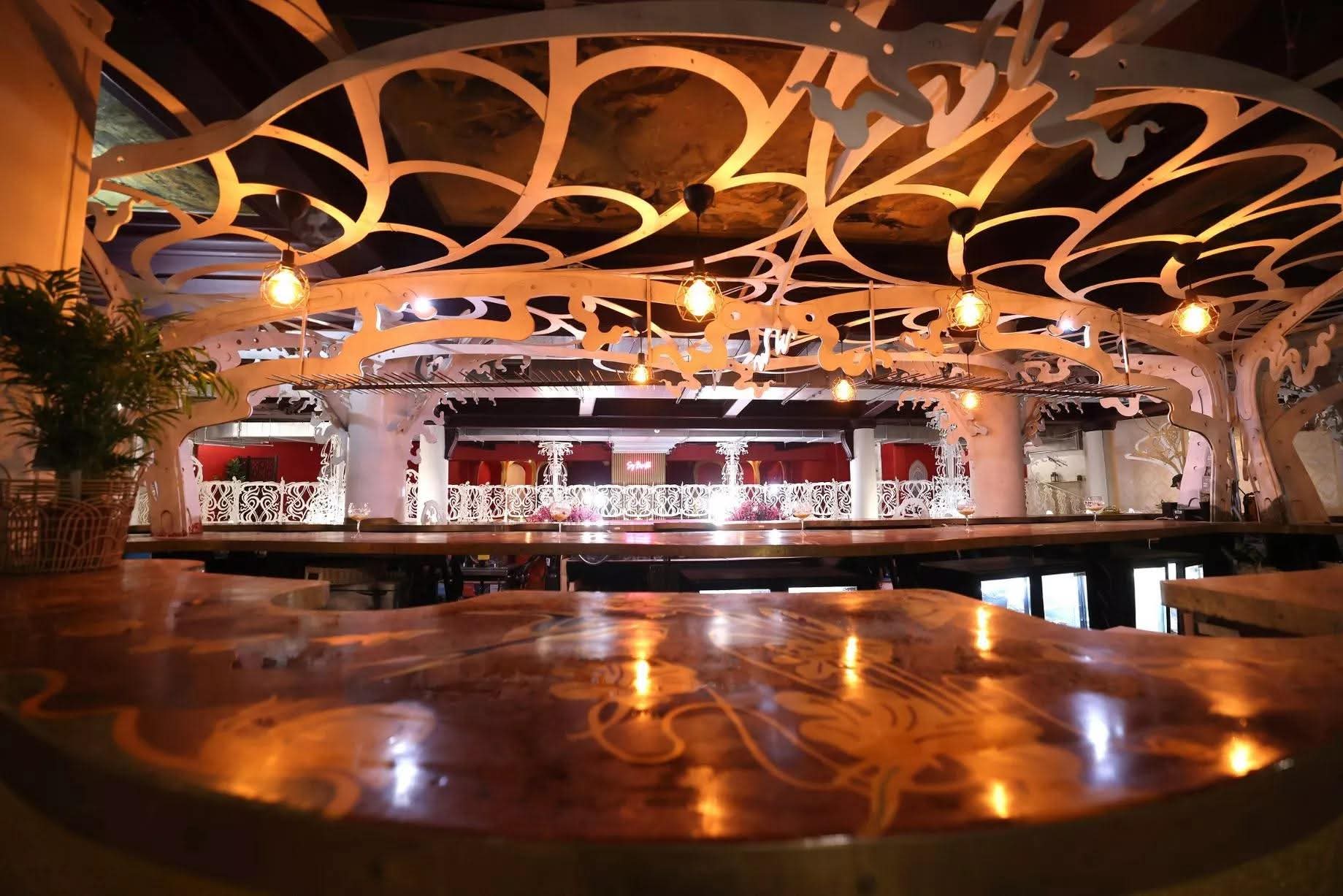 Ornate bar with decorative ceiling at Fozia's